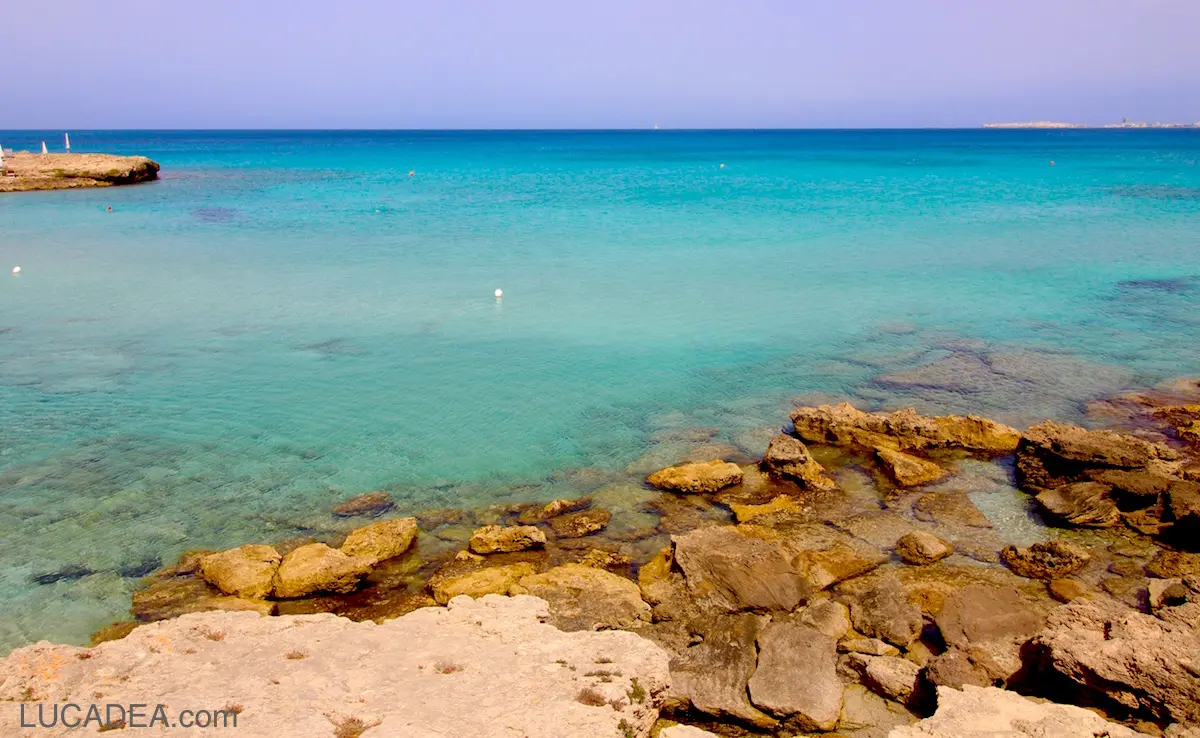 Punta della Suina beach in Salento with golden sand and crystal clear sea near Gallipoli