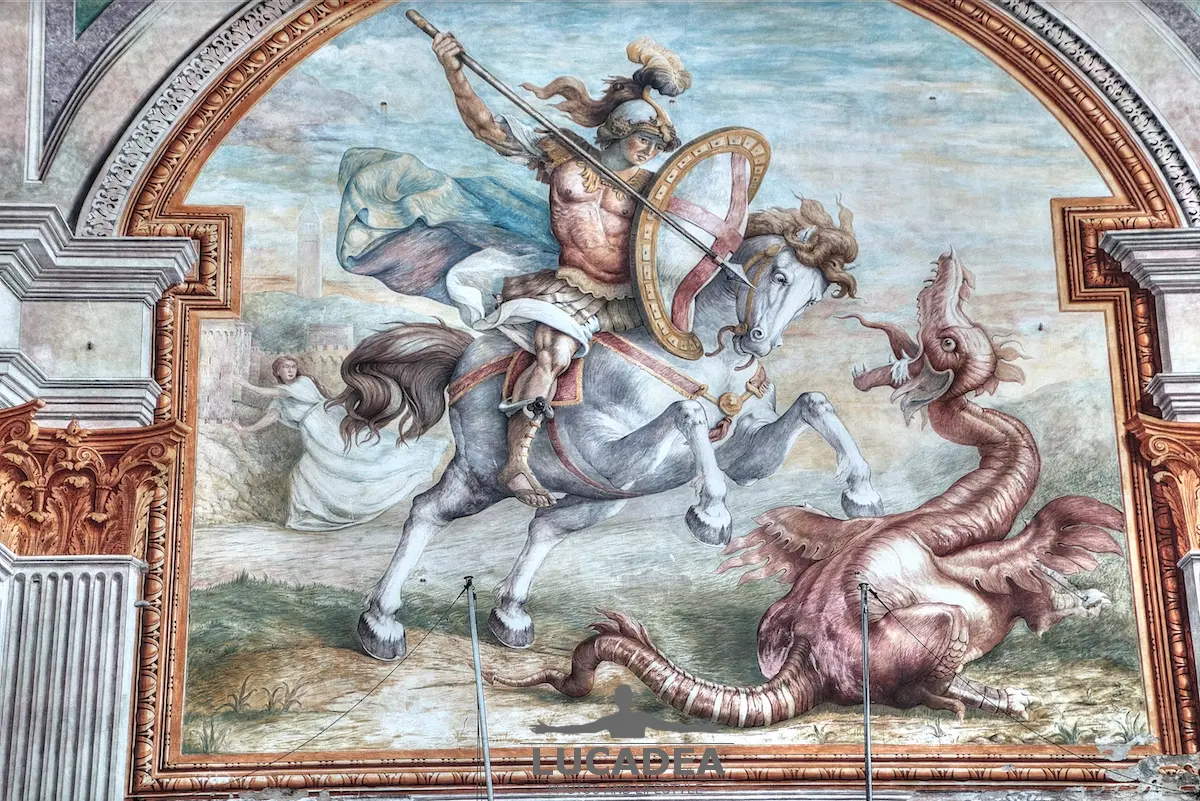 The Palace of Saint George in Genoa, a historic building overlooking the Old Port with a painted façade depicting Saint George and the dragon