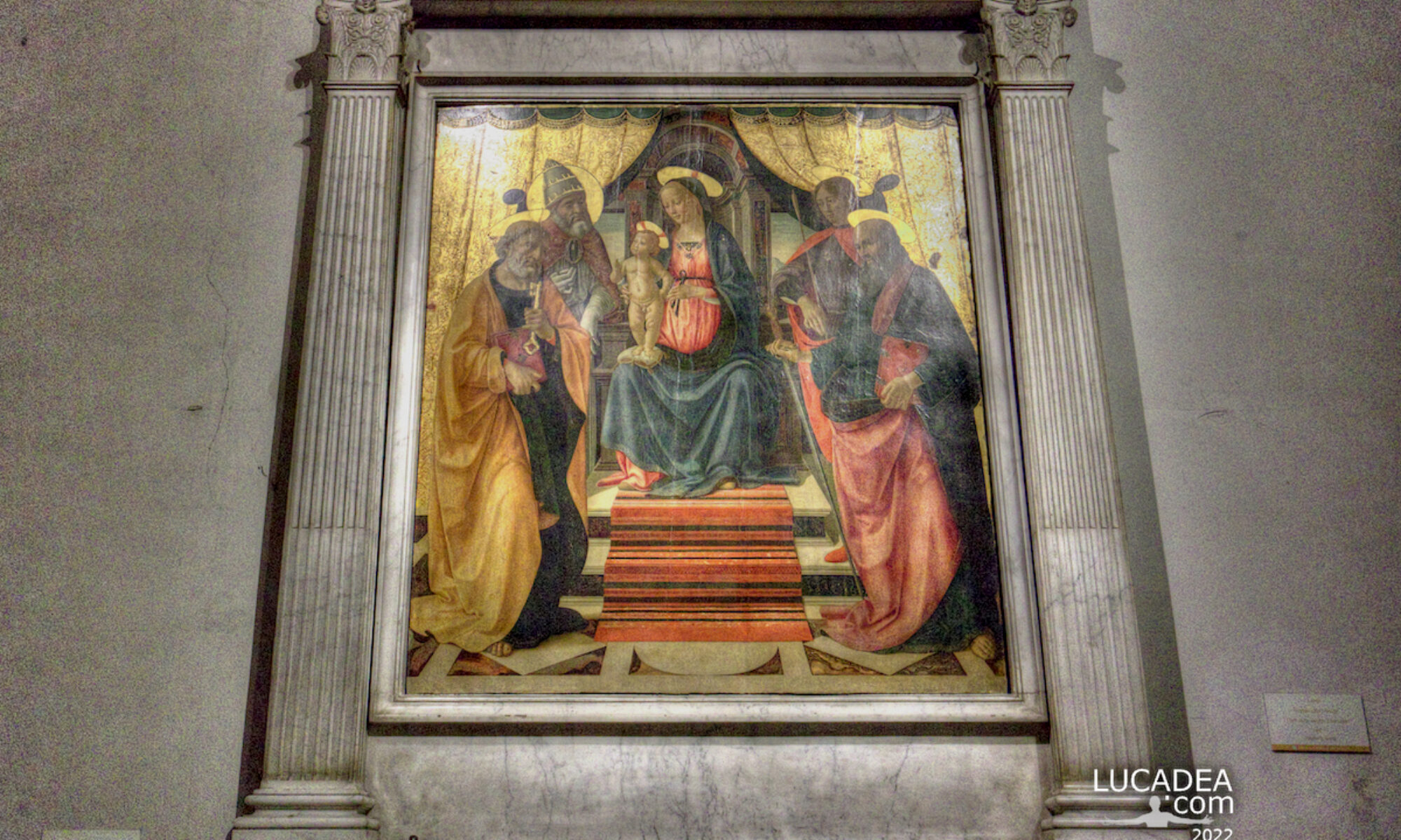 Il dipinto "Madonna in trono col Bambino e Santi" del Ghirlandaio a Lucca