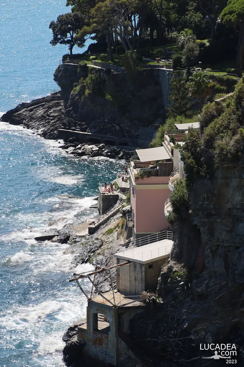 View of Pieve Ligure coast with Scalo Chiappa, rocky shoreline and Mediterranean sea in Liguria