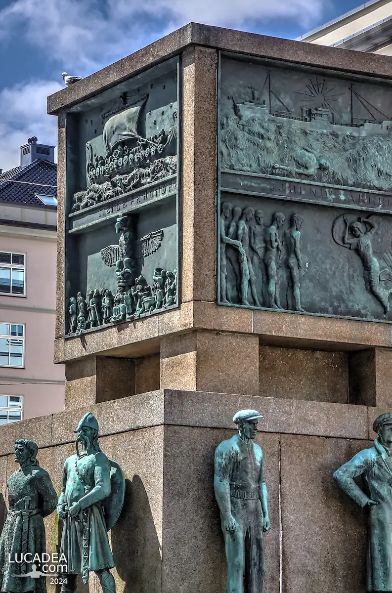 The Sailors’ Monument in Bergen with bronze figures standing around the central structure in Torgallmenningen